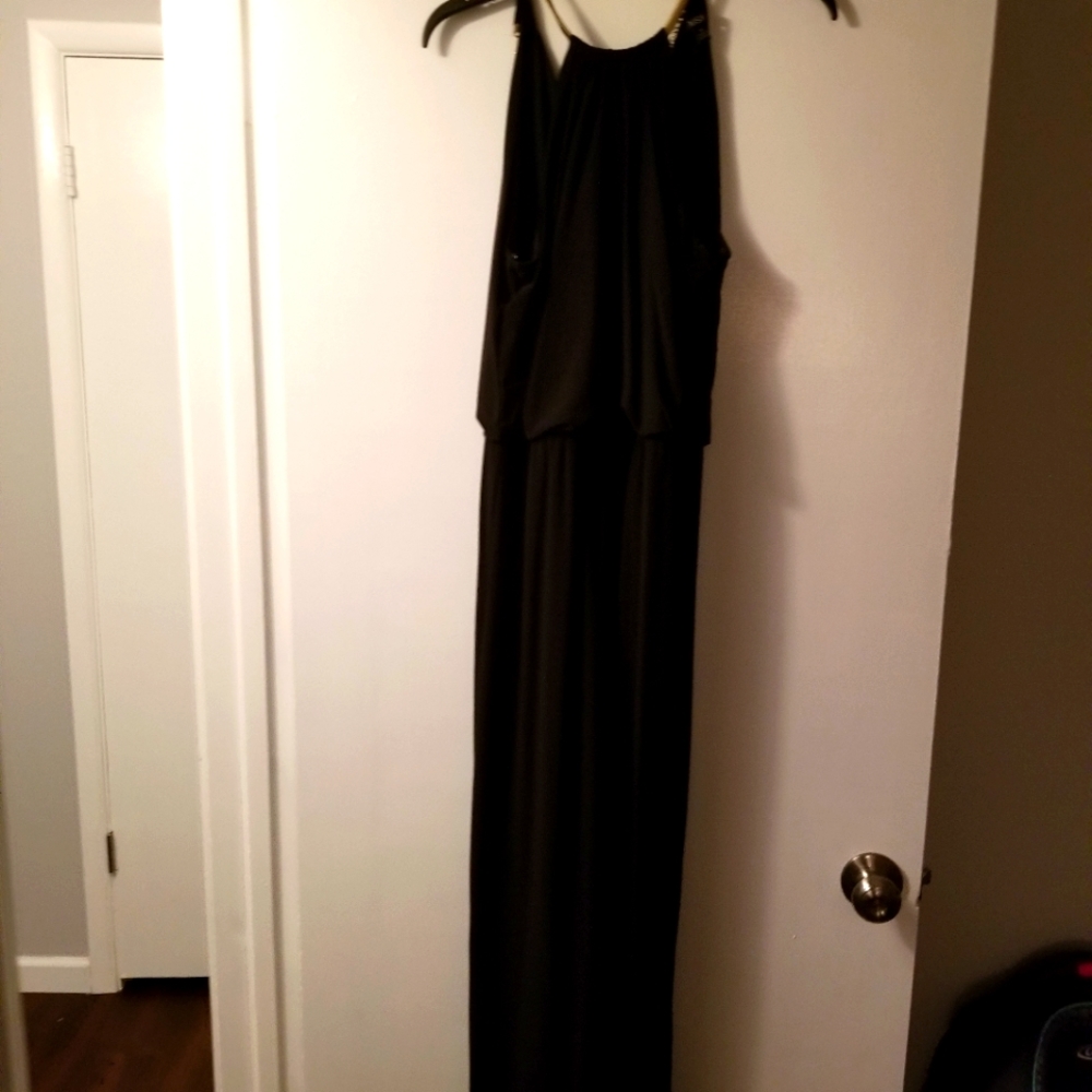 Size 10 black maxi style dress with elastic waste synch.